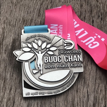 Huy chương Digi World Bước Chân Ươm Mầm Xanh -